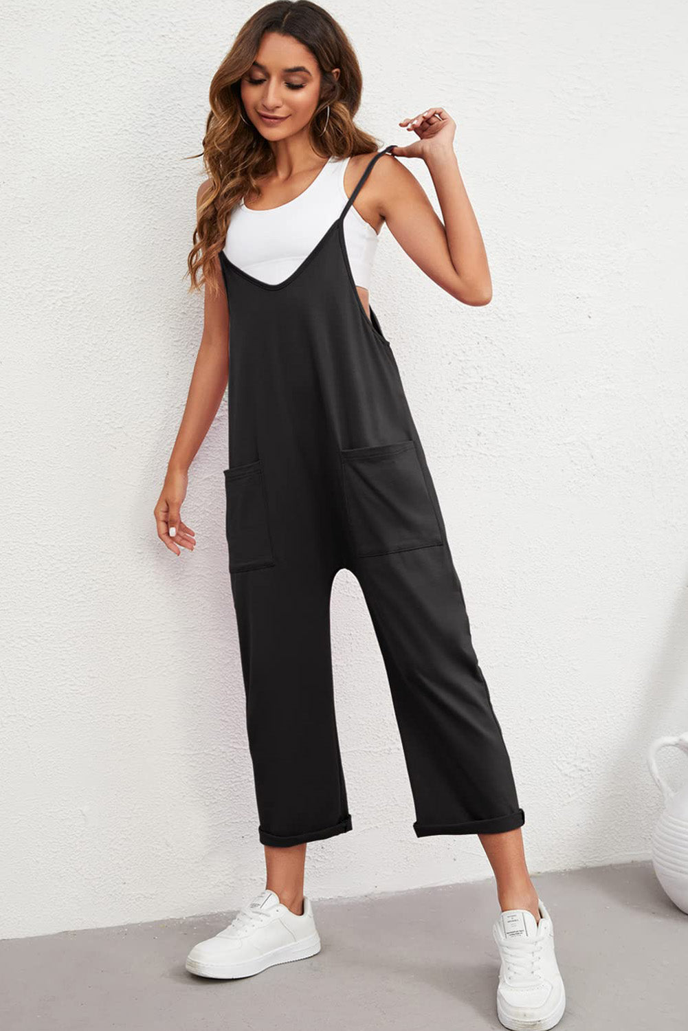 Black Pocketed Adjustable Spaghetti Strap Straight Leg JumpsuitMaterial:95%POLYESTER+5%ELASTANE


	


		Straight leg jumpsuit can perfectly shape
wearers’ leg shapes
	
	
		Adjustable spaghetti strap is perfect to
suit w