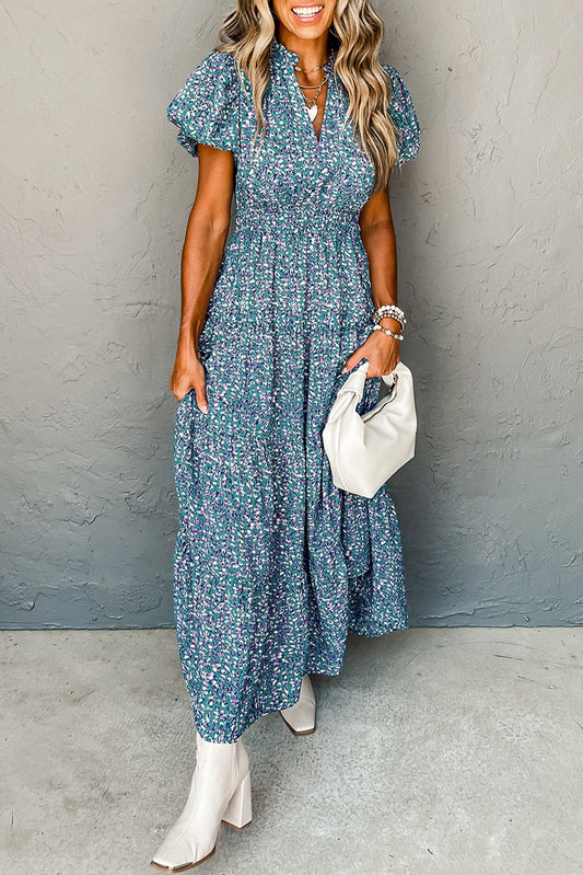 Blue Abstract Print Split V Neck Shirred High Waist Maxi DressMaterial:100%Viscose

• Embrace bohemian elegance with our dress, featuring a unique abstract pattern in shades of blue, perfect for a beach vacation or summer gath