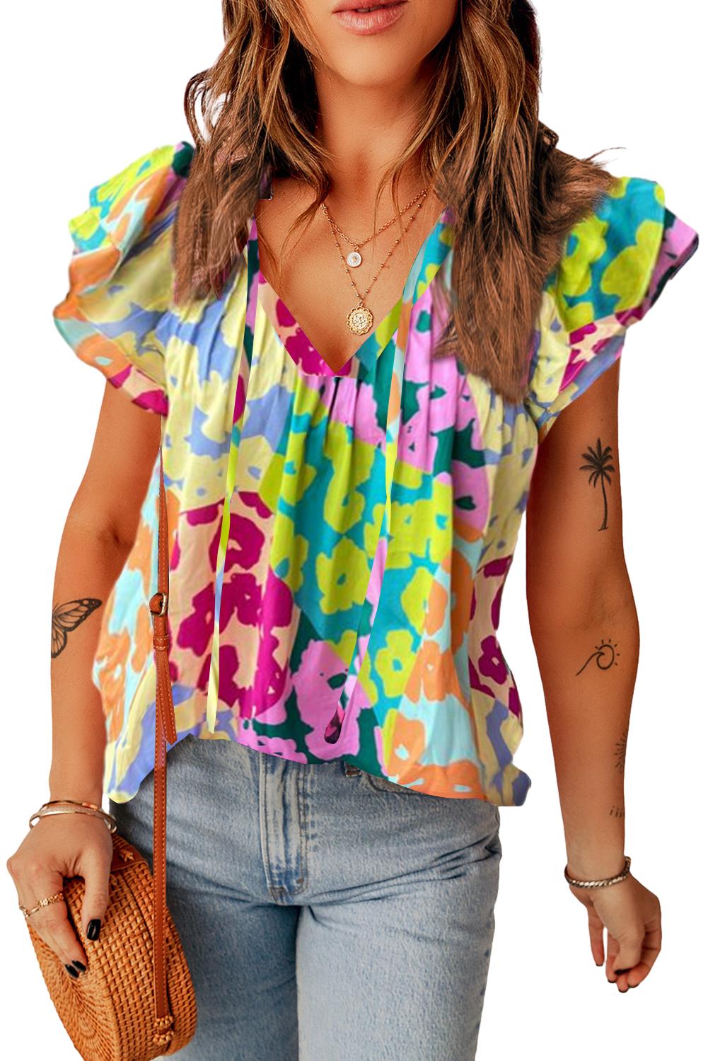 Multicolour Leopard Flutter Sleeve V Neck Crinkled BlouseMaterial:100%Polyester

• Stand out in style with this blouse, perfect for adding a touch of wild elegance to your wardrobe.
• The vibrant multicolored leopard pri