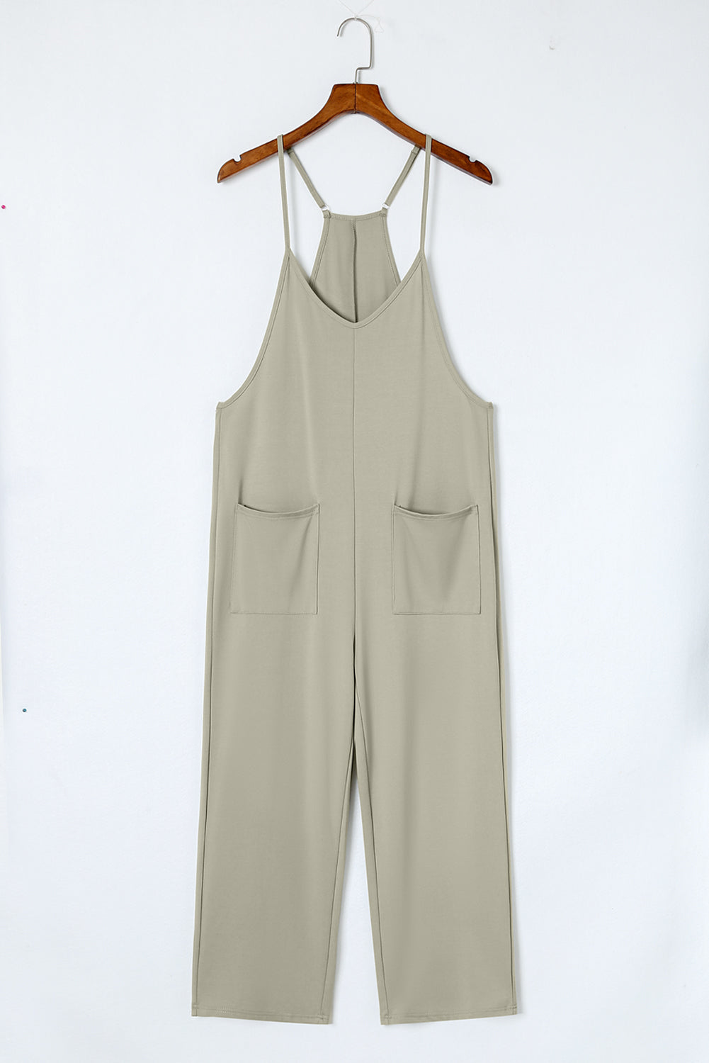 Black Pocketed Adjustable Spaghetti Strap Straight Leg JumpsuitMaterial:95%POLYESTER+5%ELASTANE


	


		Straight leg jumpsuit can perfectly shape
wearers’ leg shapes
	
	
		Adjustable spaghetti strap is perfect to
suit w