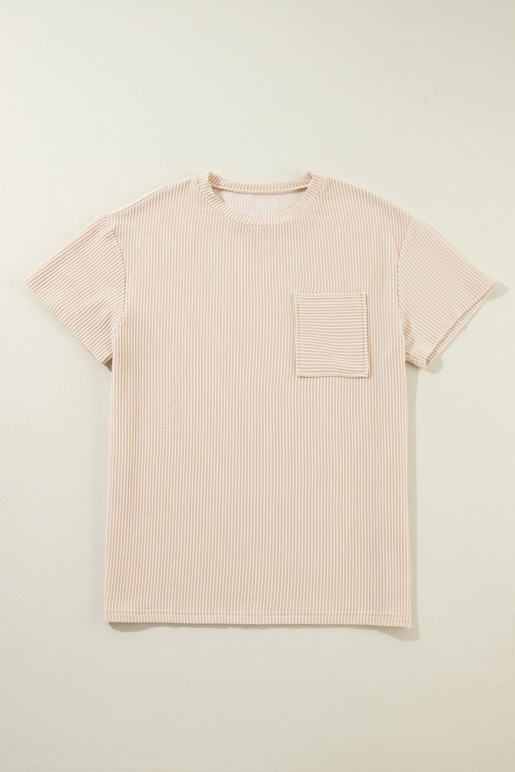 Pink Crinkle Rib Knit Pocketed Loose Fit Crew Neck T ShirtMaterial:75%Polyester+20%Viscose+5%Elastane

• Pink T Shirt offers a charming, feminine touch with its soft pink color and crinkle rib texture, perfect for a casual