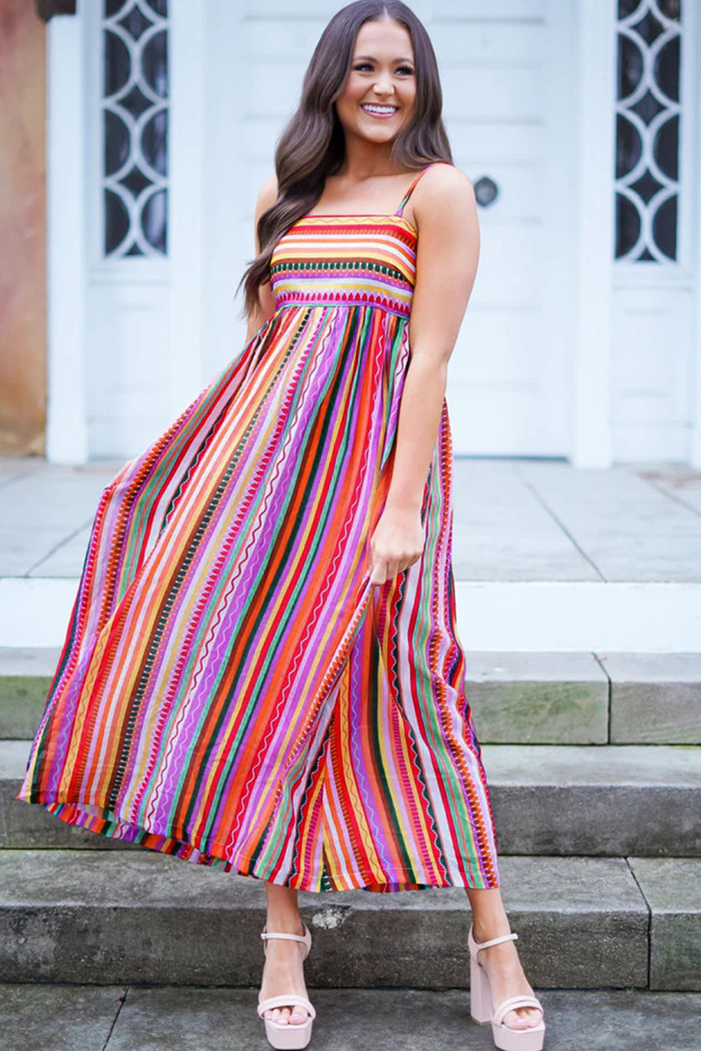 Multicolour Boho Striped Spaghetti Strap Smocked Back Maxi DressMaterial:100%Polyester

• Embrace a vibrant blend of colors in this maxi dress, perfect for daily wear with its relaxed, sleeveless design.
• The shirred back ensu