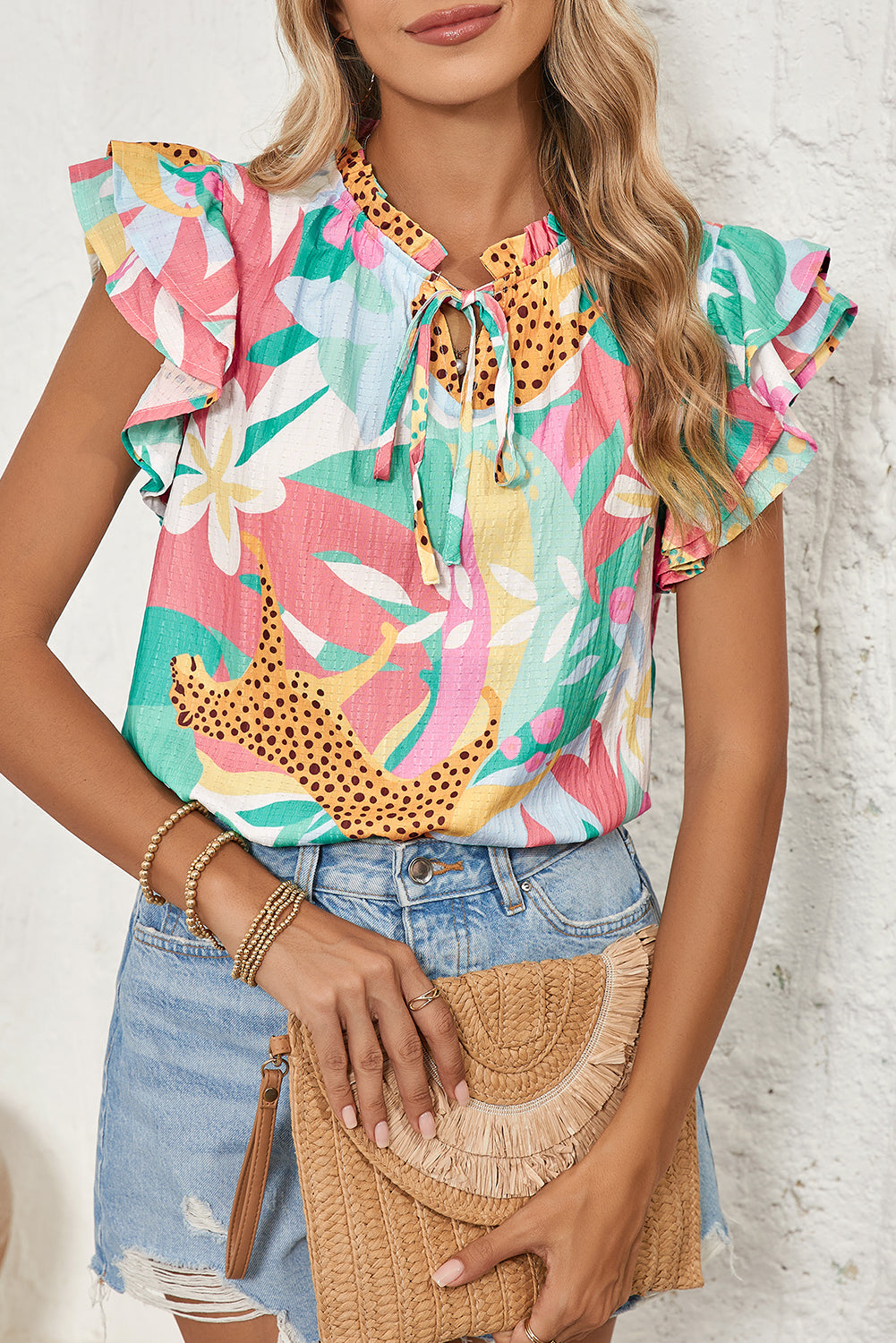 Green Tie Split Neck Ruffle Summer Cheetah Floral BlouseMaterial:100%Polyester

• Embrace the wild side of fashion with this blouse that effortlessly combines leopard print and floral patterns for a bold statement piece.