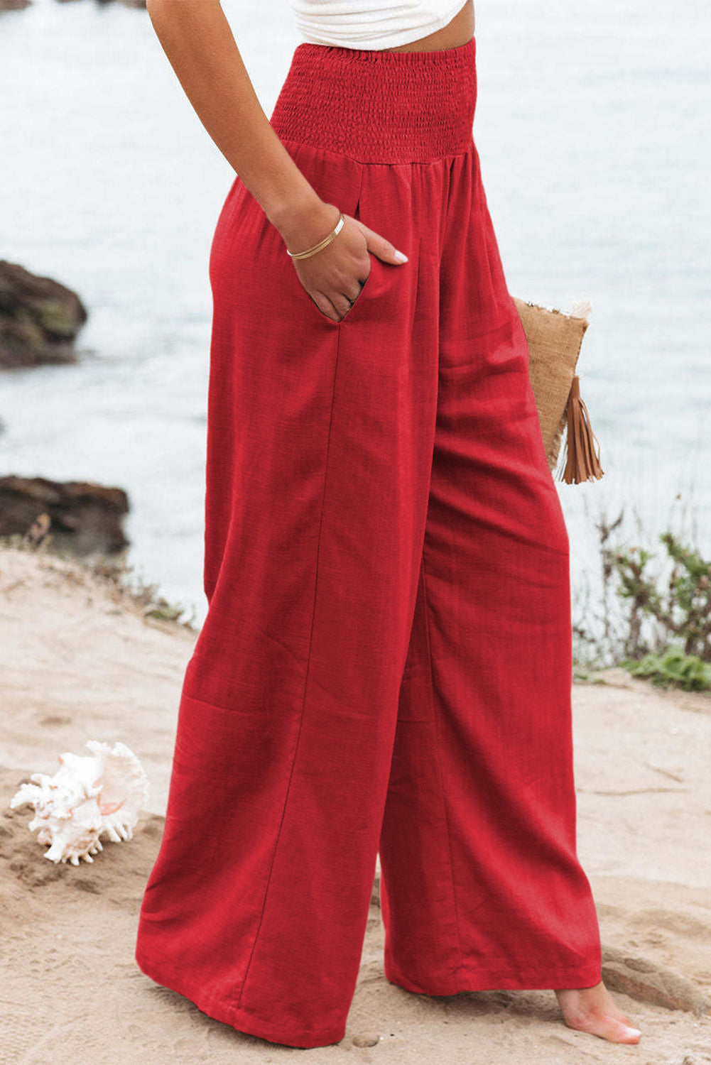 Black Smocked Wide Waistband High Waist Wide Leg PantsMaterial:65%COTTON+35%POLYESTER



		Flattering smocked waistband cinches at the
waist for a lovely silhouette
	
	
		High waist design elongates legs for a
st