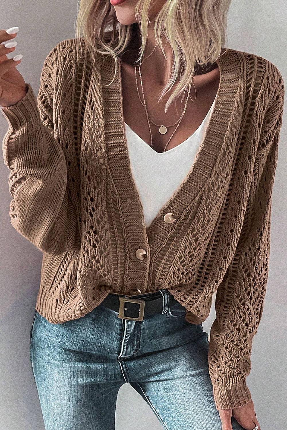 Real Teal Hollow Knit Drop Shoulder CardiganMaterial:60%Cotton+40%Acrylic

• Elevate your casual wardrobe with the cardigan, crafted for comfort and style, ideal for layering during transitional seasons.
• T