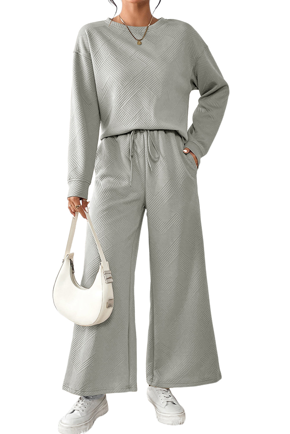 Red Dahlia Textured Loose Slouchy Long Sleeve Top and Pants SetMaterial:95%POLYESTER+5%ELASTANE



		Our Gray Textured Loose Slouchy Long Sleeve Top and Pants Set, a comfortable and stylish ensemble that is perfect for loungin