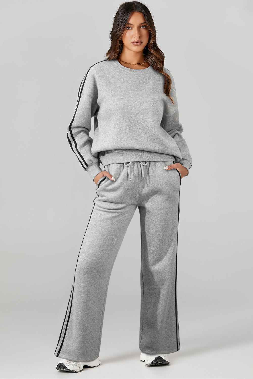 Light Grey Solid Color Side Striped Sweatshirt Pants SetMaterial:50%Polyester+50%Cotton

• This pants set exudes a modern appeal perfect for casual outings or lounging at home.
• Crafted from high-quality fabric for a s