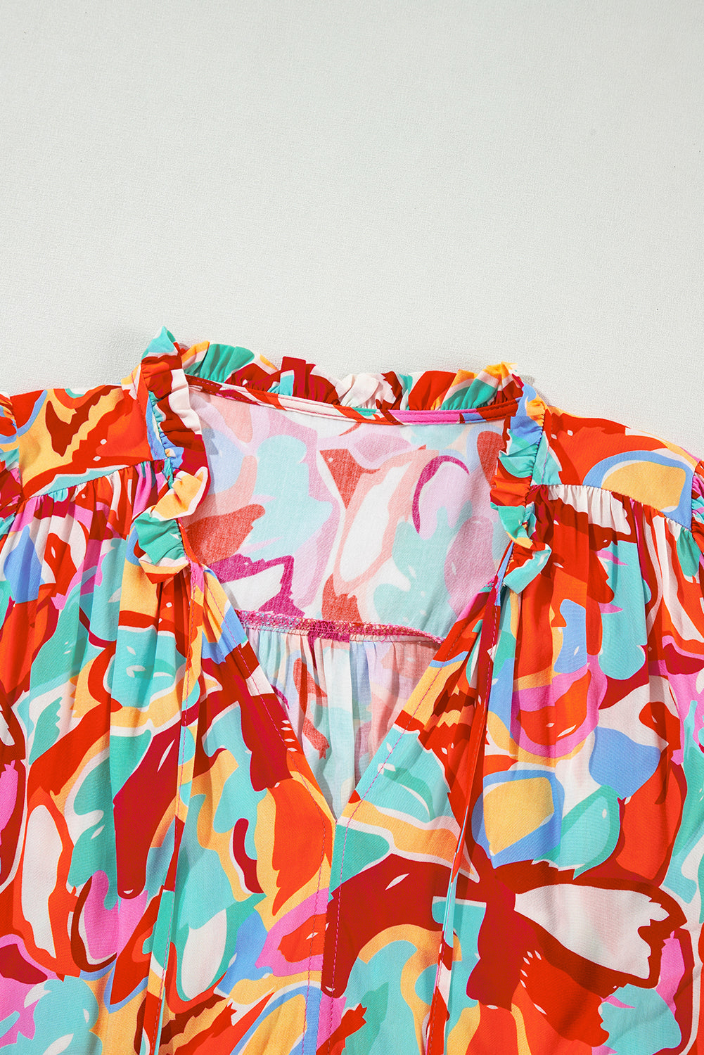 Rose Red Abstract Print V Neck Puff Sleeve BlouseMaterial:100%Viscose



		Make a statement with our blouse, crafted from a lightweight and eye-catching fabric that exudes personality and style.
	
	
		This blo