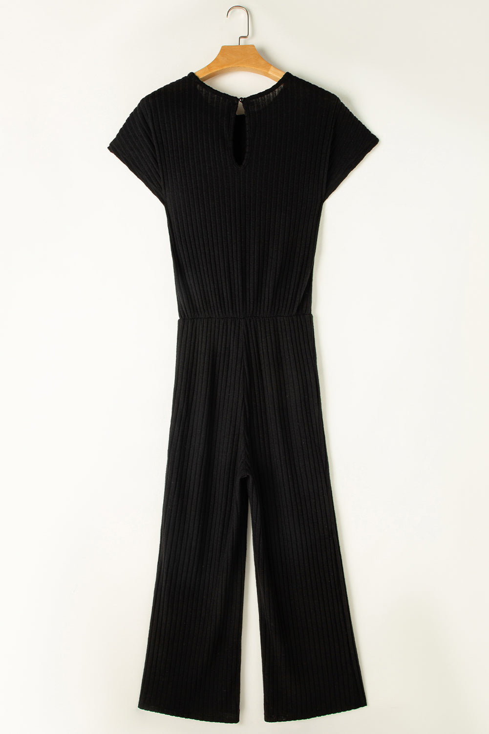 Grass Green Solid Color Ribbed Short Sleeve Wide Leg JumpsuitMaterial:85%Polyester+10%Viscose+5%Elastane



		The jumpsuit is a versatile and trendy one-piece outfit, featuring a solid color design that offers a sleek and mi