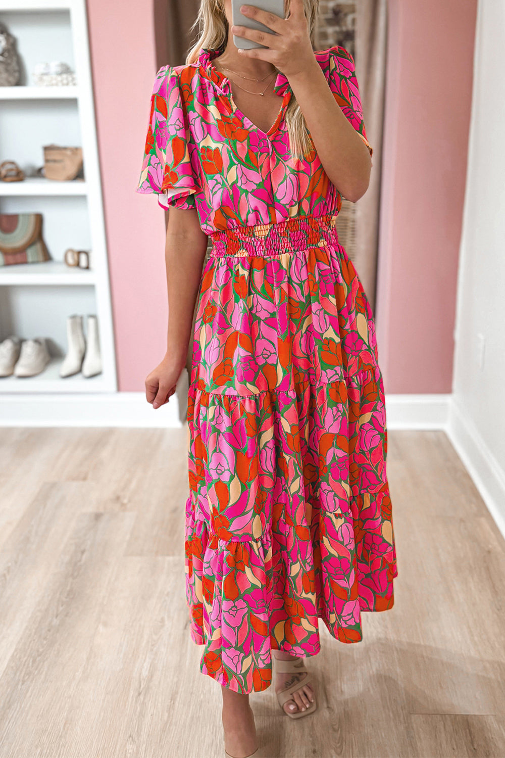 Rose Floral Flounce Sleeve Smocked Waist Tiered Maxi DressMaterial:100%Polyester

• Exude bohemian elegance in this maxi dress, featuring a smocked waist for a flattering silhouette.
• The tiered design adds a whimsical t