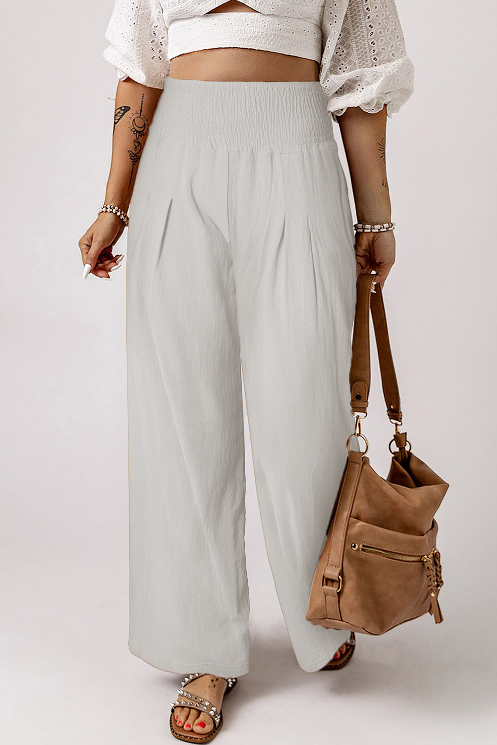 Black Smocked Wide Waistband High Waist Wide Leg PantsMaterial:65%COTTON+35%POLYESTER



		Flattering smocked waistband cinches at the
waist for a lovely silhouette
	
	
		High waist design elongates legs for a
st