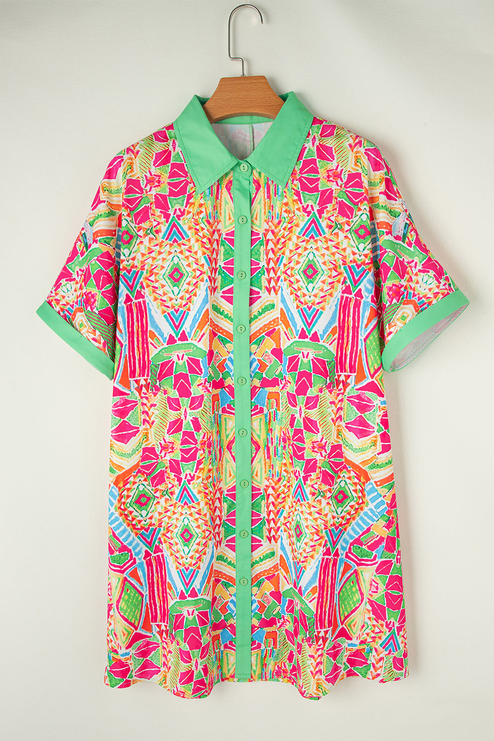 Orange Geometric Print Contrast Trim Short Sleeve Shirt DressMaterial:100%Polyester

• Stand out in vibrant orange hues with this dress featuring a geometric print that adds a trendy touch to your wardrobe. 
• The button-dow