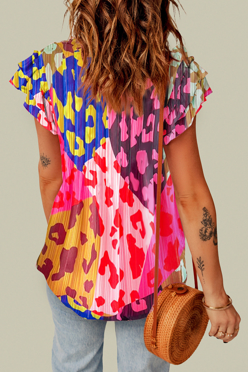 Multicolour Leopard Flutter Sleeve V Neck Crinkled BlouseMaterial:100%Polyester

• Stand out in style with this blouse, perfect for adding a touch of wild elegance to your wardrobe.
• The vibrant multicolored leopard pri