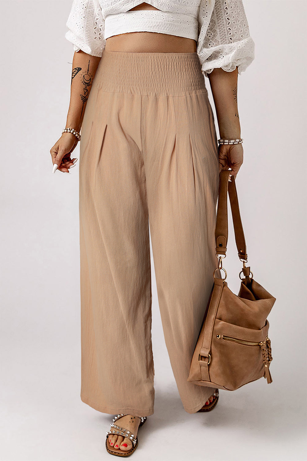 Black Smocked Wide Waistband High Waist Wide Leg PantsMaterial:65%COTTON+35%POLYESTER



		Flattering smocked waistband cinches at the
waist for a lovely silhouette
	
	
		High waist design elongates legs for a
st
