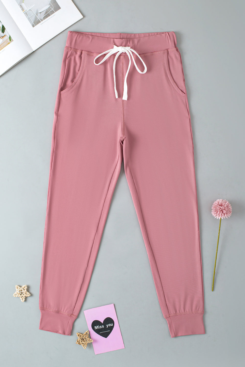 Black Casual Drawstring Drop Waist Pocketed JoggersMaterial:90%Polyester+10%Elastane



		Black can easily be paired with different tops and shoes, making it a go-to option for various outfits.
	
	
		The drawstr