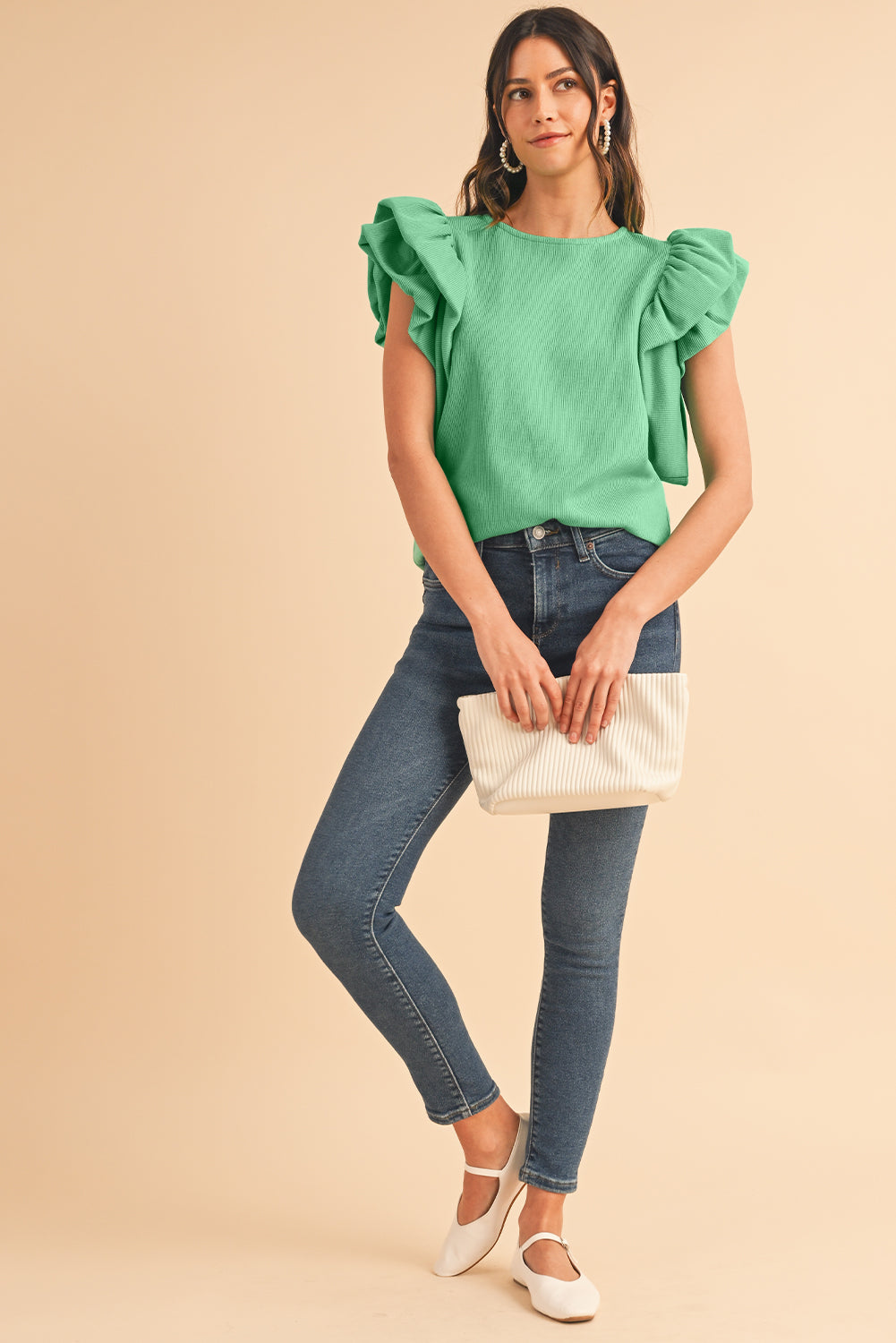 Green Solid Color Ruffle Sleeve Ribbed BlouseMaterial:65%cotton+33%polyester+2%Elastane



		The blouse features ruffle sleeves, which add a playful and romantic touch to the overall design. 
	
	
		The sol