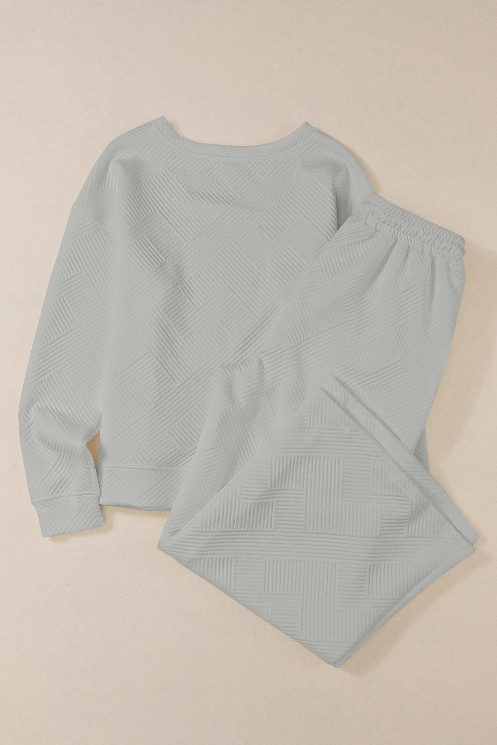 Red Dahlia Textured Loose Slouchy Long Sleeve Top and Pants SetMaterial:95%POLYESTER+5%ELASTANE



		Our Gray Textured Loose Slouchy Long Sleeve Top and Pants Set, a comfortable and stylish ensemble that is perfect for loungin