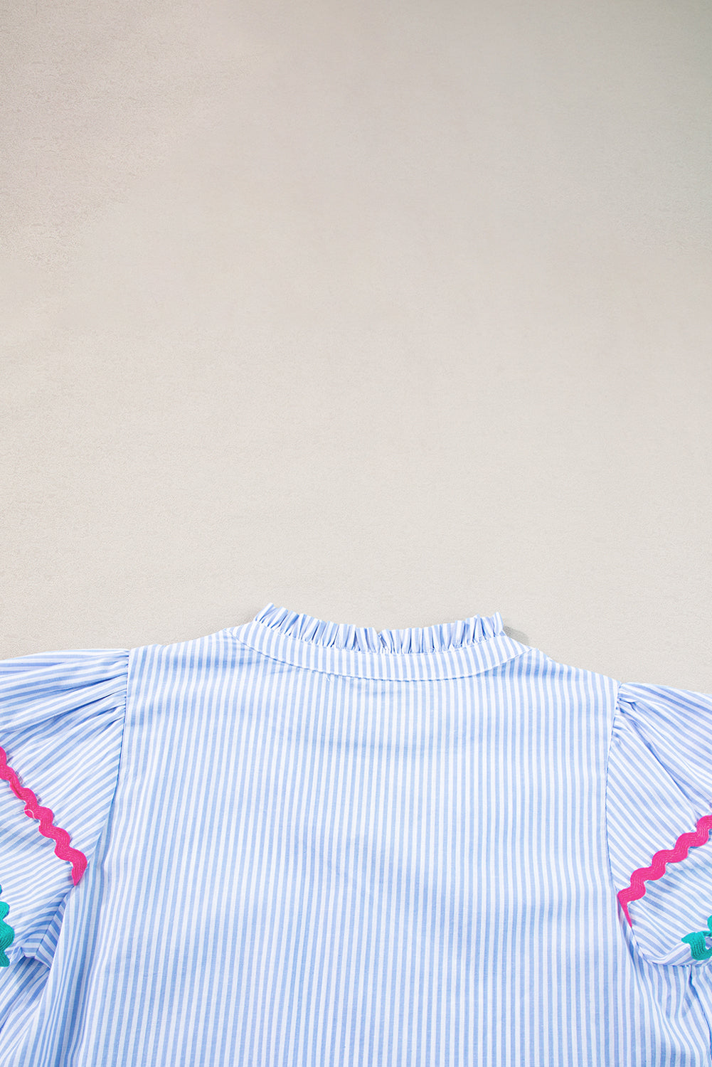 Sky Blue Striped Ricrac Splicing Frill V-Neck BlouseMaterial:100%Cotton



		Playful stripes: This blouse features a fun striped pattern with flirty frill details and a flattering V-neck.
	
	
		Chic and charming: