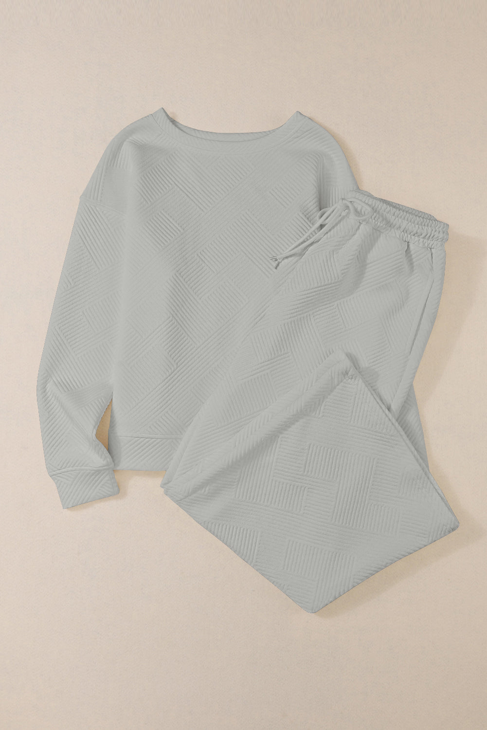 Red Dahlia Textured Loose Slouchy Long Sleeve Top and Pants SetMaterial:95%POLYESTER+5%ELASTANE



		Our Gray Textured Loose Slouchy Long Sleeve Top and Pants Set, a comfortable and stylish ensemble that is perfect for loungin