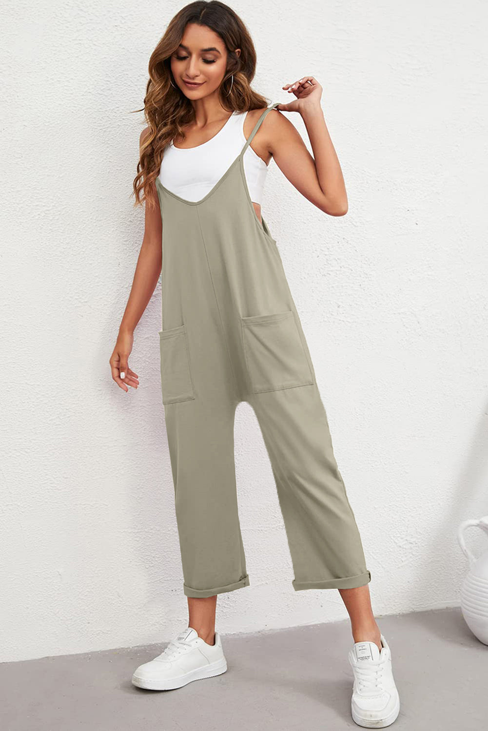 Black Pocketed Adjustable Spaghetti Strap Straight Leg JumpsuitMaterial:95%POLYESTER+5%ELASTANE


	


		Straight leg jumpsuit can perfectly shape
wearers’ leg shapes
	
	
		Adjustable spaghetti strap is perfect to
suit w