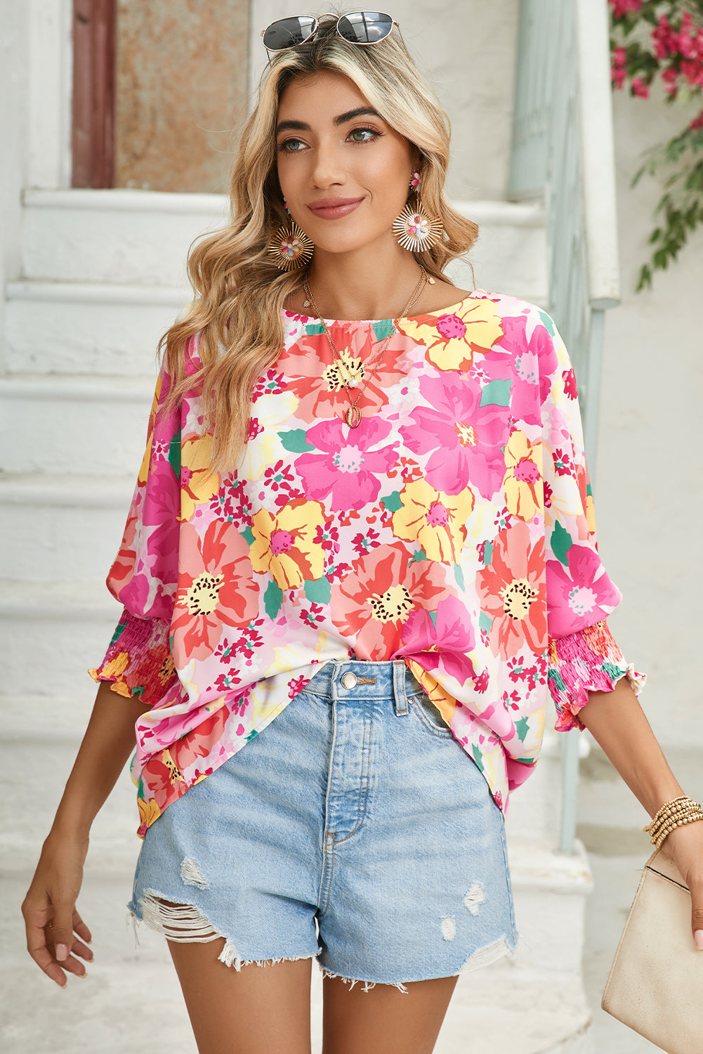 Pink Shirred Cuffs 3/4 Sleeve Boho Floral BlouseMaterial:100%Polyester



		The blouse is a stylish and feminine top featuring shirred cuffs and a boho-inspired floral print, adding a touch of bohemian charm to 