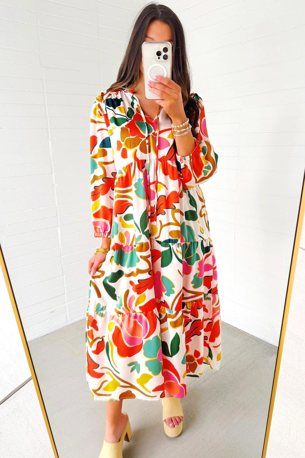 Orange Abstract Tie V Neck Tiered Maxi DressMaterial:100%Polyester

• Stand out in this maxi dress, perfect for boho-chic lovers seeking a vibrant statement piece.
• The abstract print adds a touch of artist