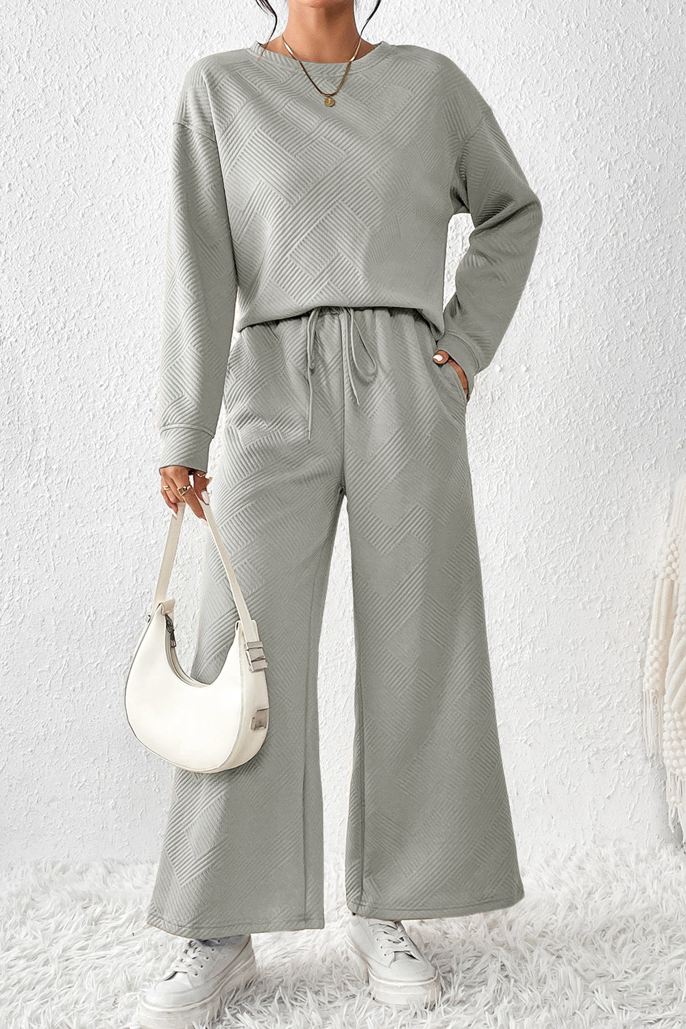 Red Dahlia Textured Loose Slouchy Long Sleeve Top and Pants SetMaterial:95%POLYESTER+5%ELASTANE



		Our Gray Textured Loose Slouchy Long Sleeve Top and Pants Set, a comfortable and stylish ensemble that is perfect for loungin