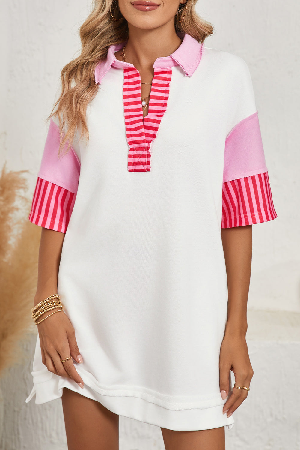 Pink Stripe Colorblock Sleeve Collared Mini DressMaterial:65%Polyester+35%Cotton

• The combination of pink and stripes adds a fun and trendy touch to your outfit.
• Embrace the relaxed vibes with the drop sleeve